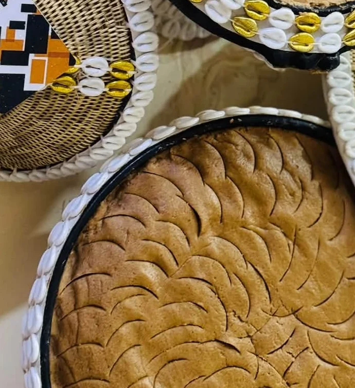 Real photograph of traditional Bale chiko, pressed and patterned in a woven basket