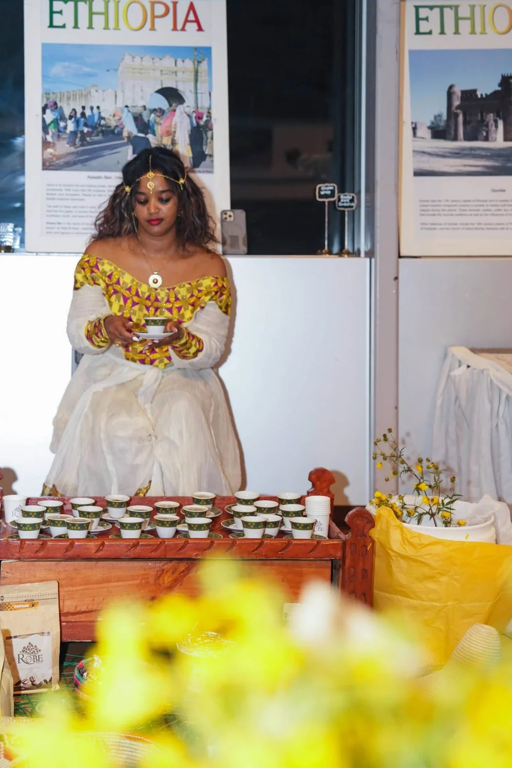 Ethiopian coffee ceremony practitioner preparing coffee