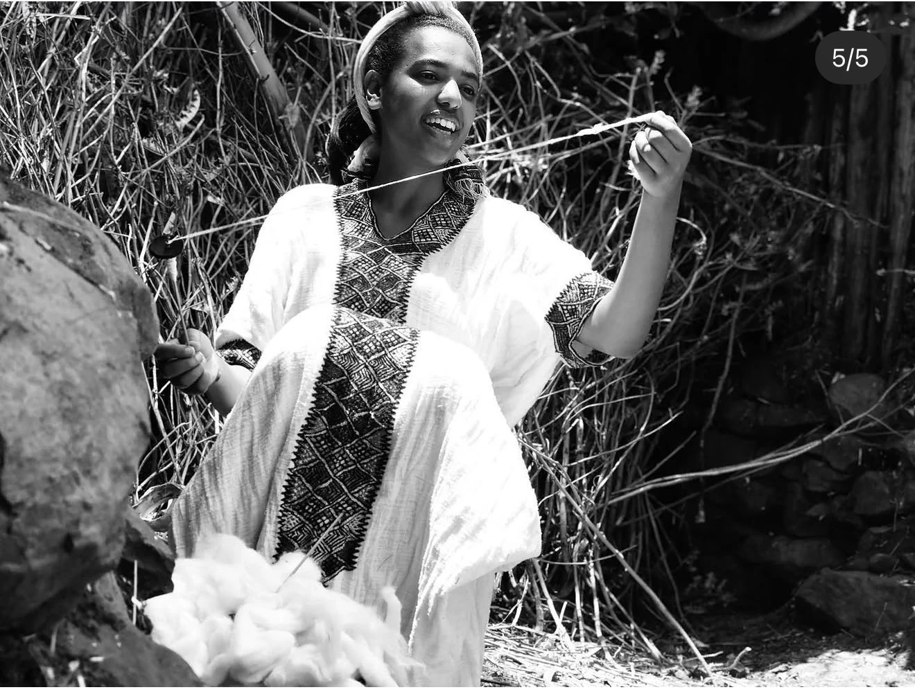Cotton being spun by hand