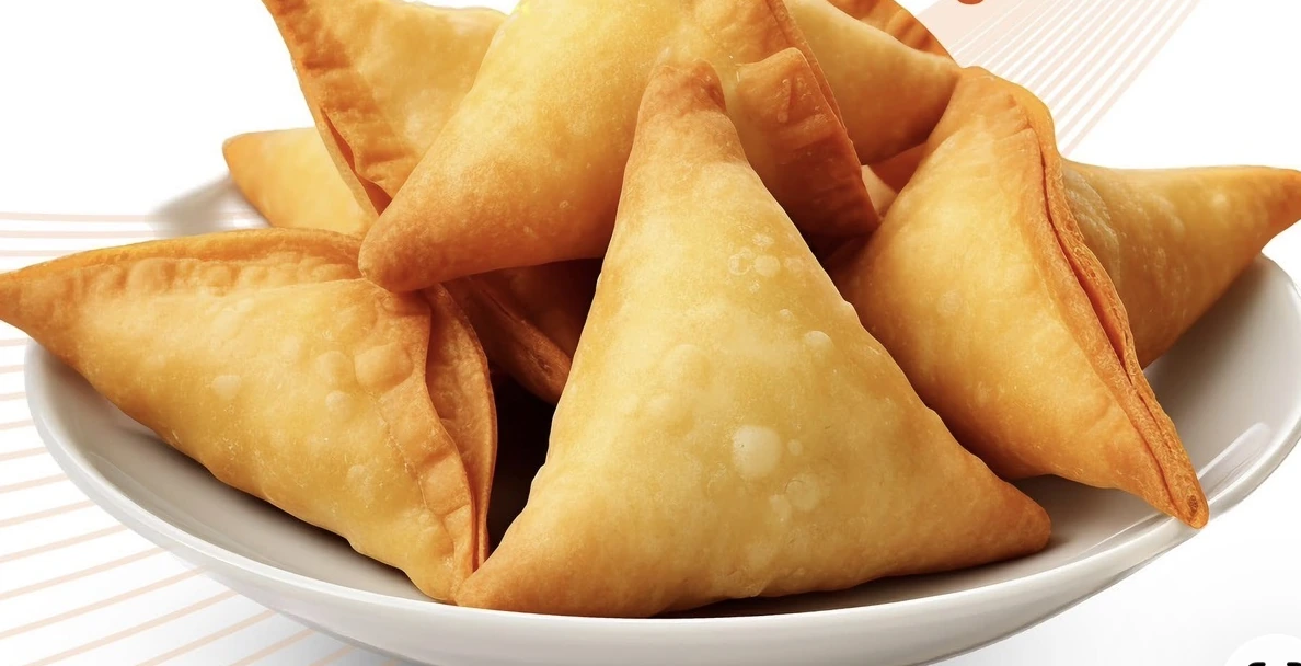 Golden triangular Ethiopian sambusa